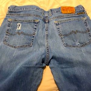 Distressed lucky jeans